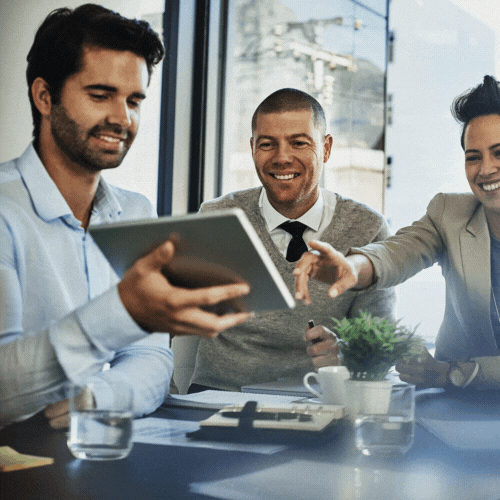 Team members collaborating and brainstorming in the office